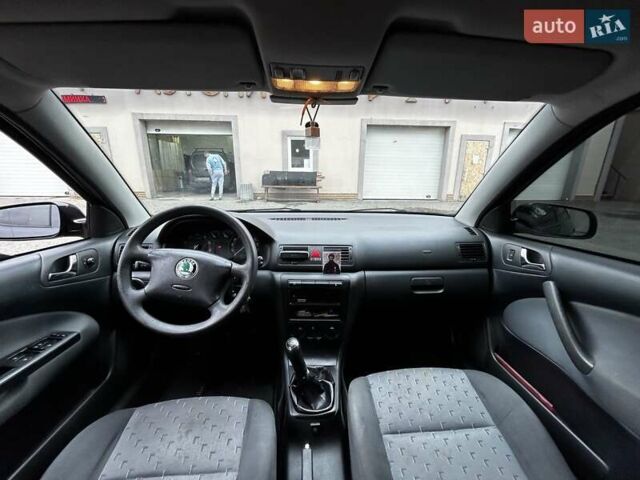 Черный Шкода Октавия, объемом двигателя 1.6 л и пробегом 221 тыс. км за 7300 $, фото 23 на Automoto.ua