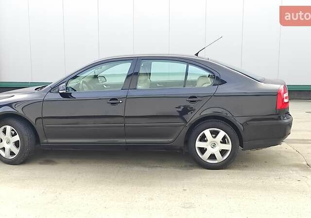 Черный Шкода Октавия, объемом двигателя 1.6 л и пробегом 218 тыс. км за 6999 $, фото 86 на Automoto.ua