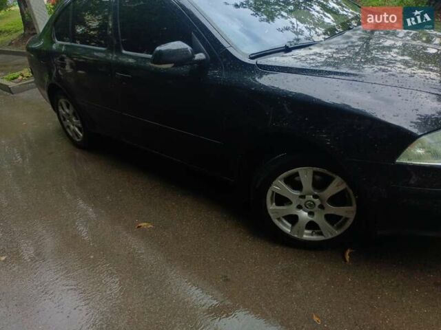 Чорний Шкода Октавія, об'ємом двигуна 2 л та пробігом 238 тис. км за 5200 $, фото 4 на Automoto.ua