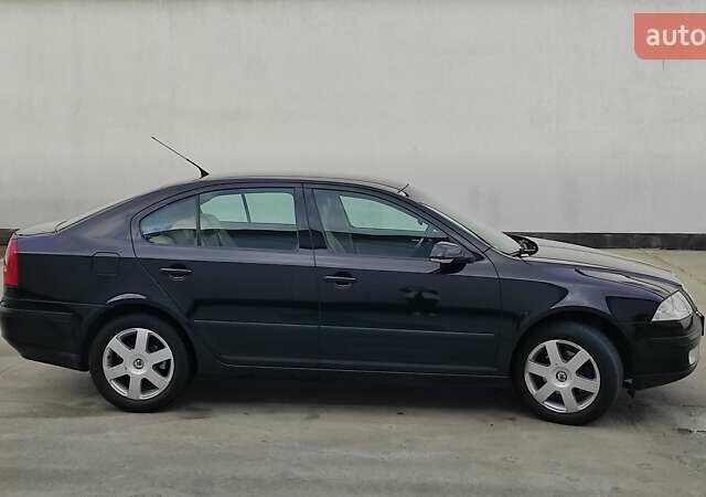 Черный Шкода Октавия, объемом двигателя 1.6 л и пробегом 218 тыс. км за 6999 $, фото 79 на Automoto.ua