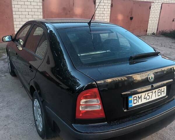 Черный Шкода Октавия, объемом двигателя 1.6 л и пробегом 291 тыс. км за 5500 $, фото 9 на Automoto.ua