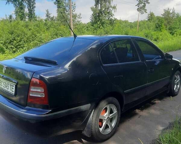 Чорний Шкода Октавія, об'ємом двигуна 1.6 л та пробігом 230 тис. км за 4400 $, фото 4 на Automoto.ua
