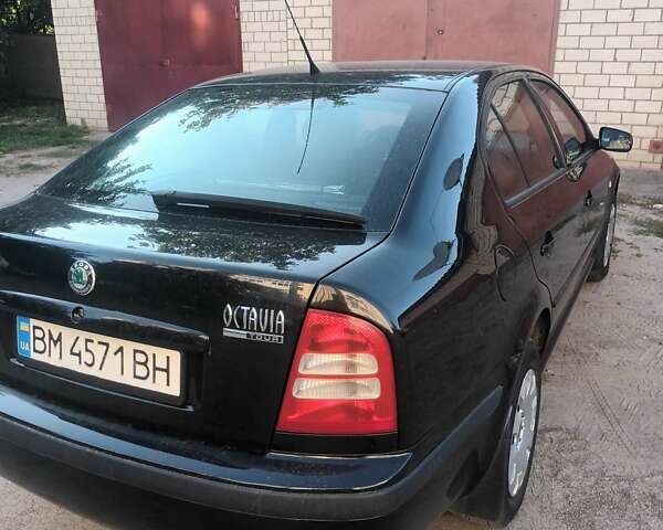 Черный Шкода Октавия, объемом двигателя 1.6 л и пробегом 291 тыс. км за 5500 $, фото 8 на Automoto.ua