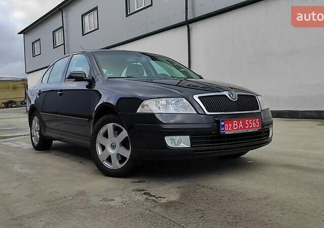 Черный Шкода Октавия, объемом двигателя 1.6 л и пробегом 218 тыс. км за 6999 $, фото 76 на Automoto.ua