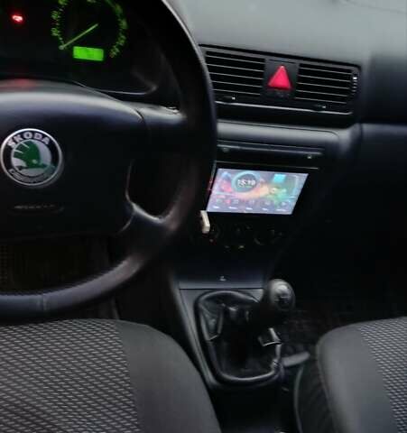 Черный Шкода Октавия, объемом двигателя 1.6 л и пробегом 175 тыс. км за 5750 $, фото 2 на Automoto.ua