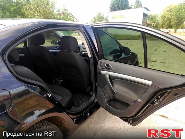 Черный Шкода Октавия, объемом двигателя 1.6 л и пробегом 212 тыс. км за 5700 $, фото 6 на Automoto.ua