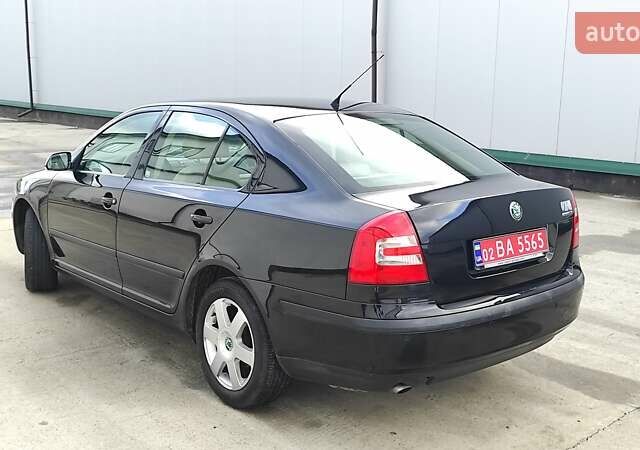 Черный Шкода Октавия, объемом двигателя 1.6 л и пробегом 218 тыс. км за 6999 $, фото 85 на Automoto.ua