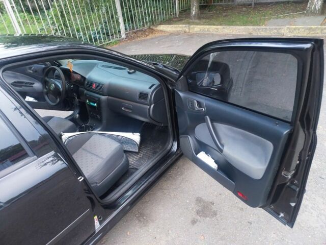 Черный Шкода Октавия, объемом двигателя 1.6 л и пробегом 177 тыс. км за 5800 $, фото 4 на Automoto.ua