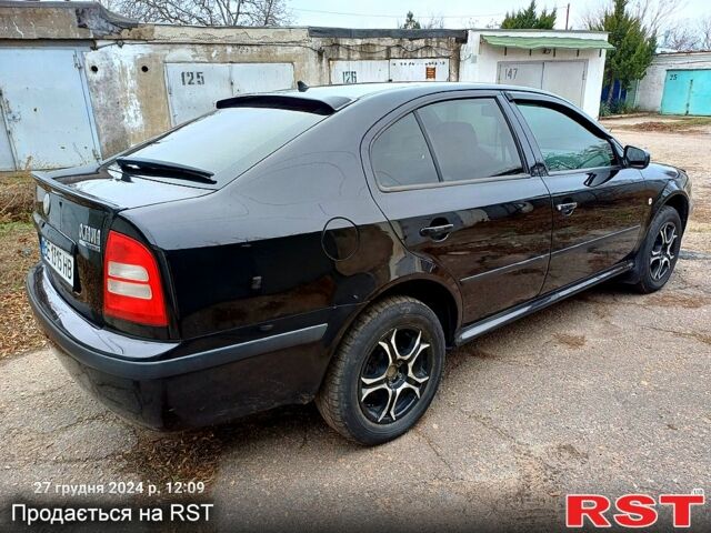 Шкода Октавия 2007 в Николаеве на Automoto.ua Черный Шкода Октавия, объемом двигателя 1.6 л и пробегом 240 тыс. км за 5333 $, фото 7 на Automoto.ua