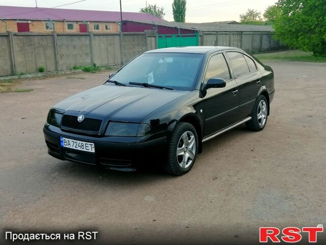 Черный Шкода Октавия, объемом двигателя 1.6 л и пробегом 220 тыс. км за 5250 $, фото 4 на Automoto.ua