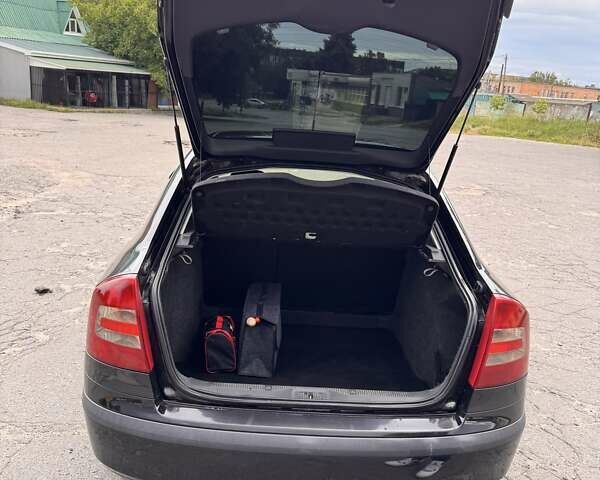 Черный Шкода Октавия, объемом двигателя 1.98 л и пробегом 300 тыс. км за 5800 $, фото 11 на Automoto.ua
