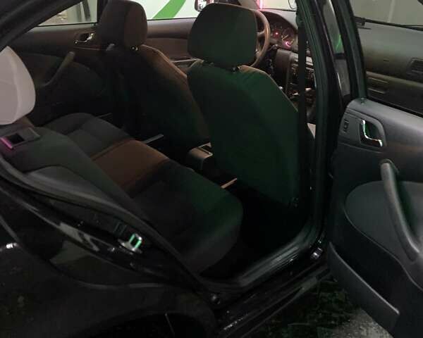 Черный Шкода Октавия, объемом двигателя 2 л и пробегом 340 тыс. км за 4800 $, фото 9 на Automoto.ua