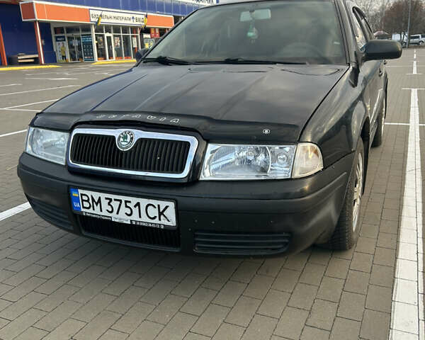 Черный Шкода Октавия, объемом двигателя 1.6 л и пробегом 263 тыс. км за 5600 $, фото 6 на Automoto.ua