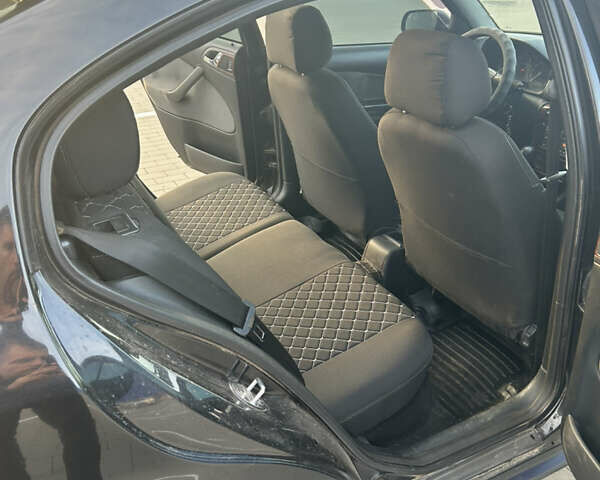 Черный Шкода Октавия, объемом двигателя 1.6 л и пробегом 263 тыс. км за 5600 $, фото 14 на Automoto.ua