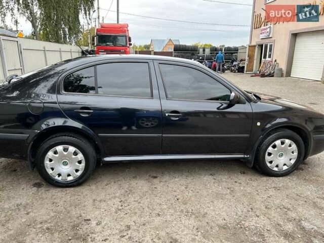 Черный Шкода Октавия, объемом двигателя 1.6 л и пробегом 221 тыс. км за 7300 $, фото 4 на Automoto.ua