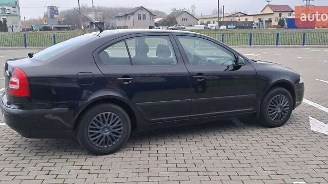 Черный Шкода Октавия, объемом двигателя 1.8 л и пробегом 226 тыс. км за 4500 $, фото 10 на Automoto.ua