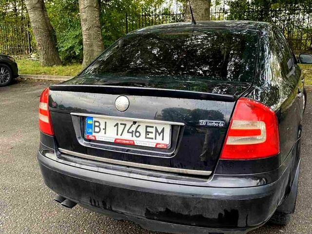 Чорний Шкода Октавія, об'ємом двигуна 2 л та пробігом 230 тис. км за 5600 $, фото 4 на Automoto.ua