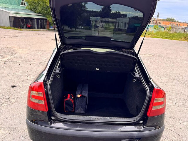 Чорний Шкода Октавія, об'ємом двигуна 2 л та пробігом 300 тис. км за 5800 $, фото 11 на Automoto.ua