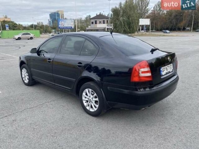 Черный Шкода Октавия, объемом двигателя 1.6 л и пробегом 210 тыс. км за 5600 $, фото 2 на Automoto.ua