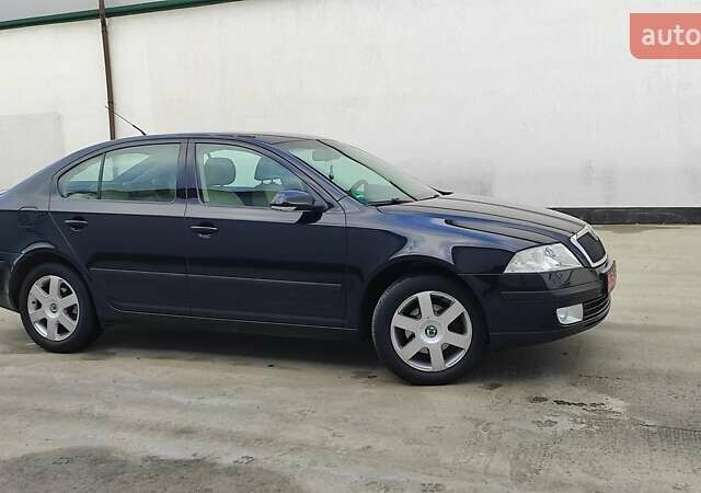 Черный Шкода Октавия, объемом двигателя 1.6 л и пробегом 218 тыс. км за 6999 $, фото 78 на Automoto.ua