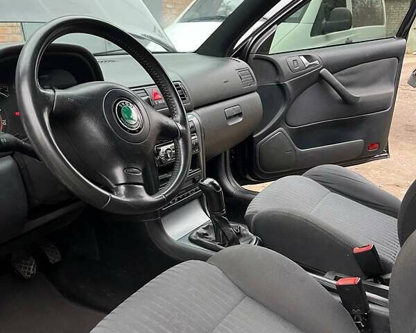 Черный Шкода Октавия, объемом двигателя 1.8 л и пробегом 265 тыс. км за 7000 $, фото 8 на Automoto.ua