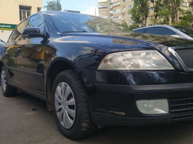 Черный Шкода Октавия, объемом двигателя 1 л и пробегом 275 тыс. км за 5500 $, фото 4 на Automoto.ua