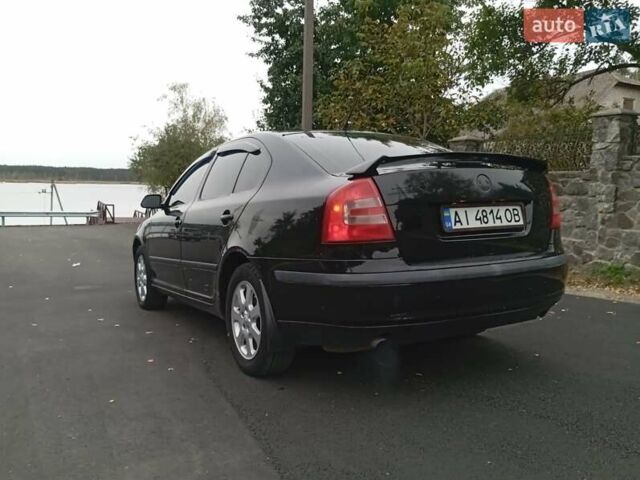 Черный Шкода Октавия, объемом двигателя 1.6 л и пробегом 420 тыс. км за 4250 $, фото 9 на Automoto.ua