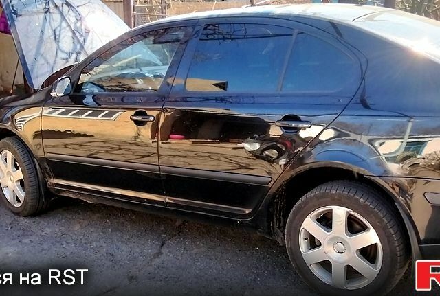 Черный Шкода Октавия, объемом двигателя 2 л и пробегом 270 тыс. км за 4300 $, фото 1 на Automoto.ua