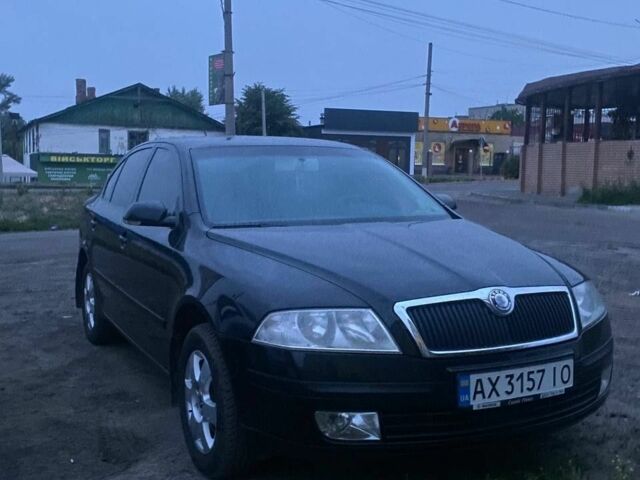 Черный Шкода Октавия, объемом двигателя 2 л и пробегом 180 тыс. км за 6700 $, фото 2 на Automoto.ua