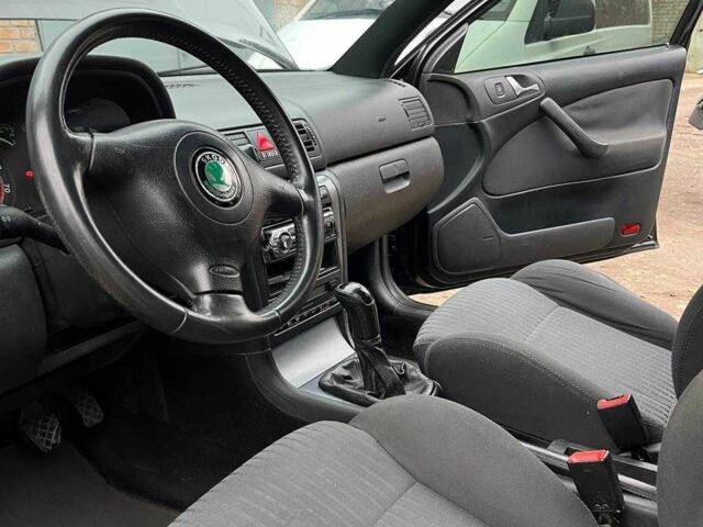 Чорний Шкода Октавія, об'ємом двигуна 1.8 л та пробігом 265 тис. км за 7000 $, фото 8 на Automoto.ua