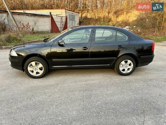 Черный Шкода Октавия, объемом двигателя 1.6 л и пробегом 220 тыс. км за 7500 $, фото 2 на Automoto.ua