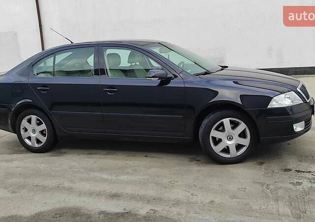 Черный Шкода Октавия, объемом двигателя 1.6 л и пробегом 218 тыс. км за 6999 $, фото 10 на Automoto.ua