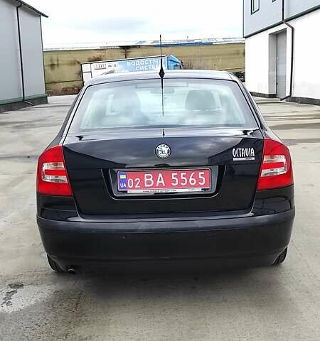 Черный Шкода Октавия, объемом двигателя 1.6 л и пробегом 218 тыс. км за 6999 $, фото 82 на Automoto.ua