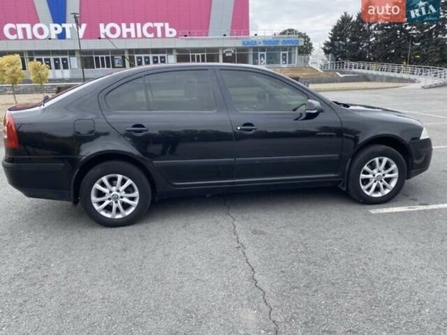Черный Шкода Октавия, объемом двигателя 1.6 л и пробегом 210 тыс. км за 5600 $, фото 7 на Automoto.ua
