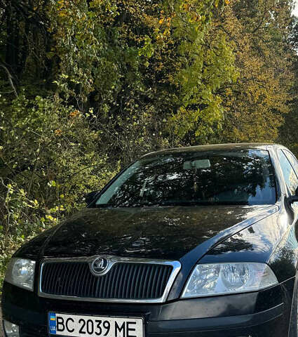 Черный Шкода Октавия, объемом двигателя 1.62 л и пробегом 248 тыс. км за 5600 $, фото 1 на Automoto.ua