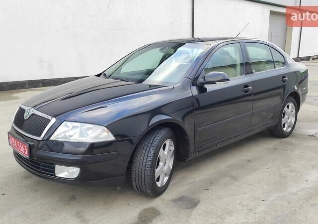 Черный Шкода Октавия, объемом двигателя 1.6 л и пробегом 218 тыс. км за 6999 $, фото 93 на Automoto.ua