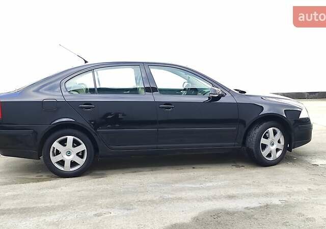 Черный Шкода Октавия, объемом двигателя 1.6 л и пробегом 218 тыс. км за 6999 $, фото 80 на Automoto.ua