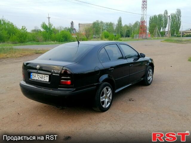 Черный Шкода Октавия, объемом двигателя 1.6 л и пробегом 220 тыс. км за 5250 $, фото 9 на Automoto.ua