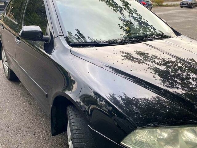 Чорний Шкода Октавія, об'ємом двигуна 2 л та пробігом 230 тис. км за 5600 $, фото 2 на Automoto.ua