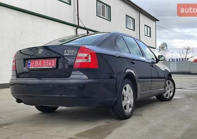 Черный Шкода Октавия, объемом двигателя 1.6 л и пробегом 218 тыс. км за 6999 $, фото 13 на Automoto.ua