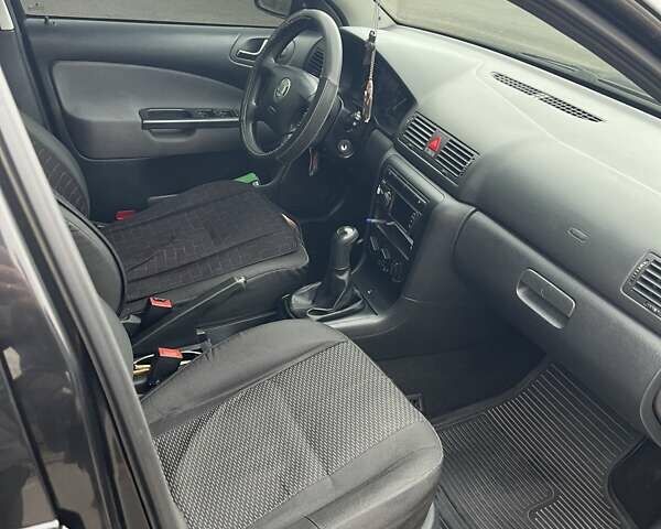 Чорний Шкода Октавія, об'ємом двигуна 1.6 л та пробігом 230 тис. км за 6100 $, фото 6 на Automoto.ua