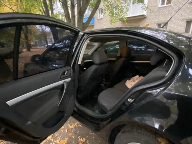 Черный Шкода Октавия, объемом двигателя 1.6 л и пробегом 245 тыс. км за 4900 $, фото 6 на Automoto.ua