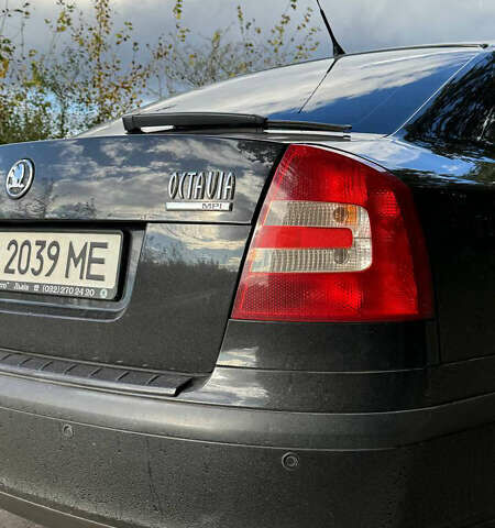 Черный Шкода Октавия, объемом двигателя 1.62 л и пробегом 248 тыс. км за 5600 $, фото 8 на Automoto.ua