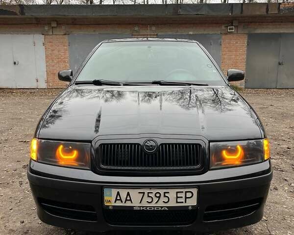 Черный Шкода Октавия, объемом двигателя 1.8 л и пробегом 265 тыс. км за 7000 $, фото 2 на Automoto.ua