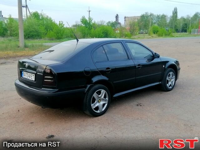 Черный Шкода Октавия, объемом двигателя 1.6 л и пробегом 220 тыс. км за 5250 $, фото 2 на Automoto.ua