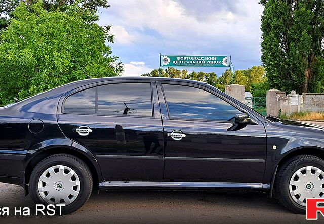 Черный Шкода Октавия, объемом двигателя 1.6 л и пробегом 135 тыс. км за 5750 $, фото 2 на Automoto.ua