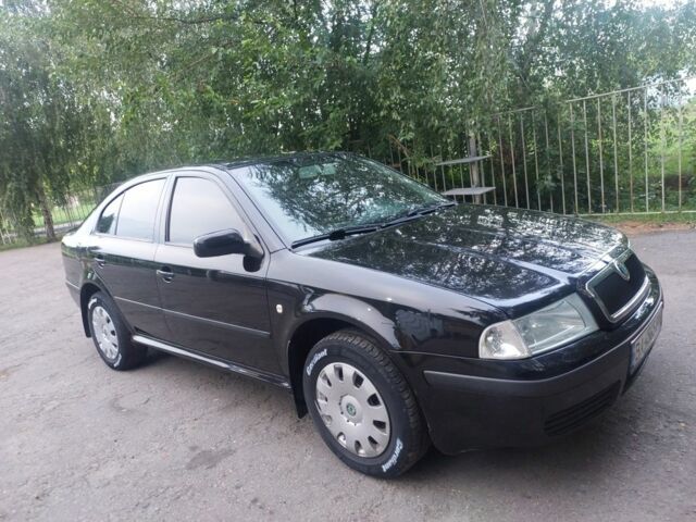 Черный Шкода Октавия, объемом двигателя 1.6 л и пробегом 177 тыс. км за 5800 $, фото 7 на Automoto.ua