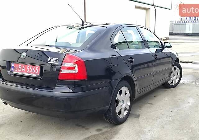 Черный Шкода Октавия, объемом двигателя 1.6 л и пробегом 218 тыс. км за 6999 $, фото 81 на Automoto.ua