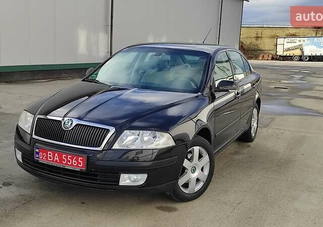 Черный Шкода Октавия, объемом двигателя 1.6 л и пробегом 218 тыс. км за 6999 $, фото 5 на Automoto.ua