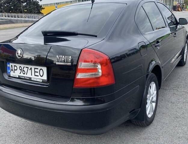 Черный Шкода Октавия, объемом двигателя 1.6 л и пробегом 210 тыс. км за 5600 $, фото 1 на Automoto.ua